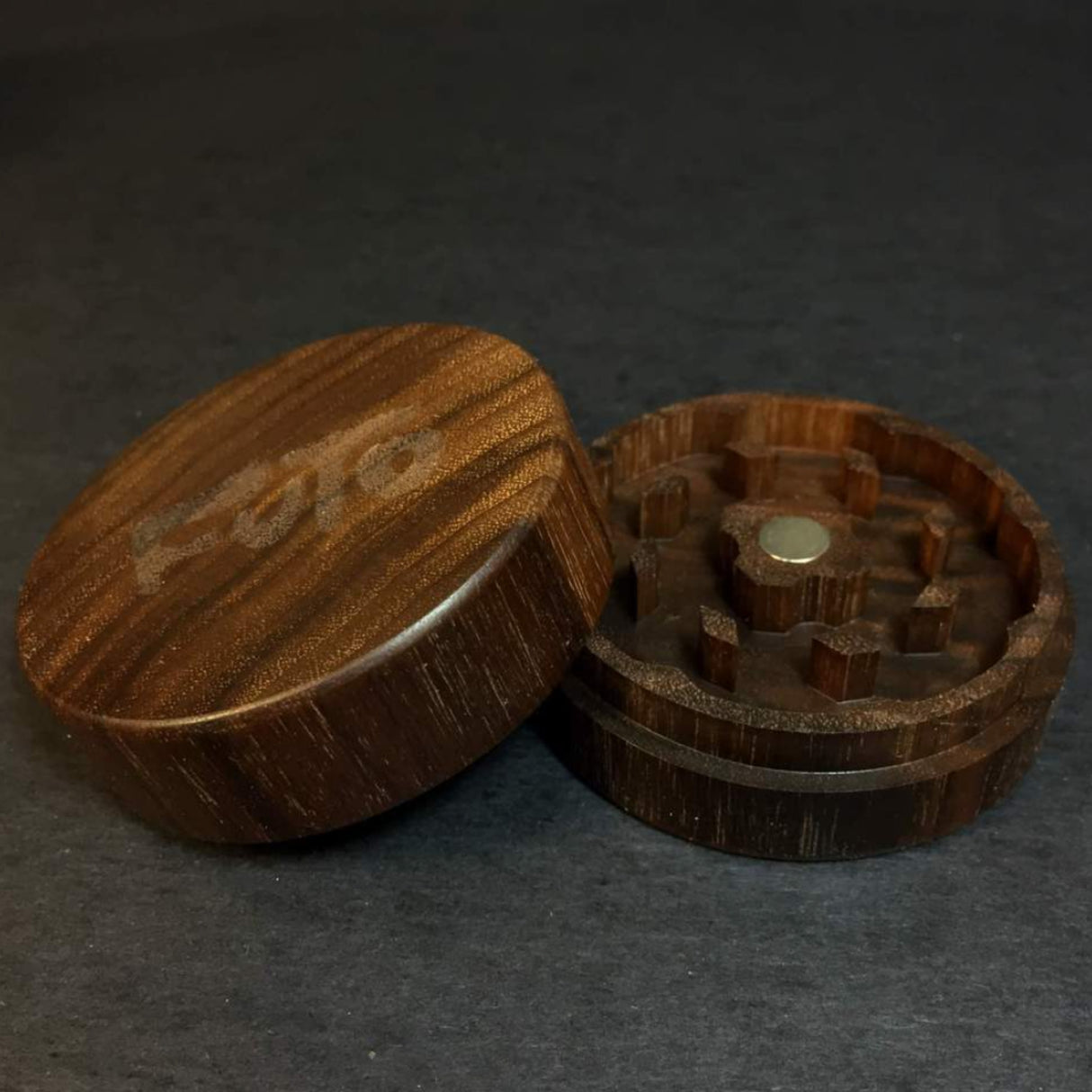 walnut futo herb grinder in 2 sections on grey background