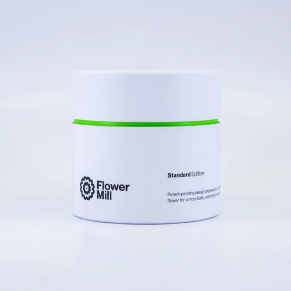 flowermill herb grinder white, black and green packaging on white background