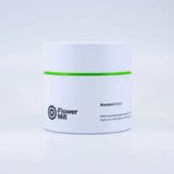 flowermill herb grinder white, black and green packaging on white background