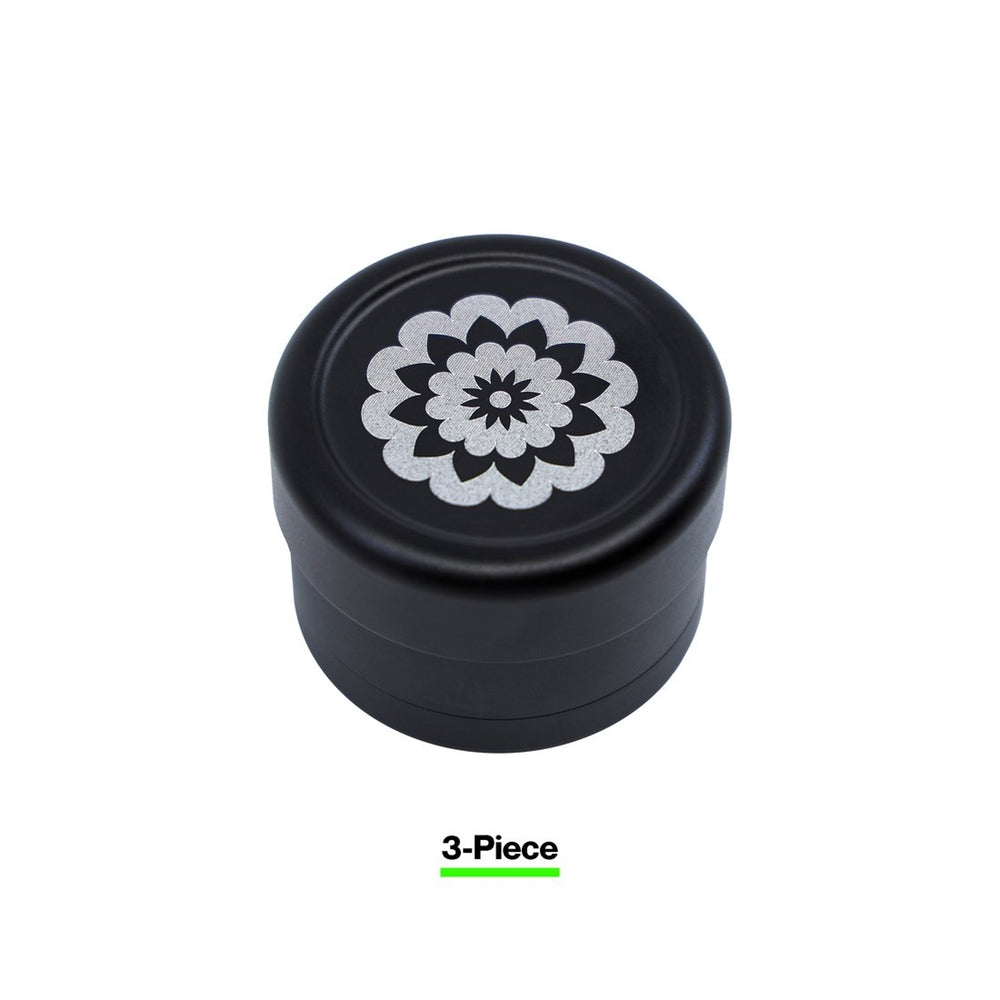 black and grey flowermill 2.5 standard herb grinder with white flowermill branding  on white background