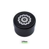black and grey flowermill 2.5 standard herb grinder with white flowermill branding  on white background