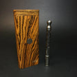 futostash XL for dynavap stood upright on grey background with dynavap OmniVap standing next to it