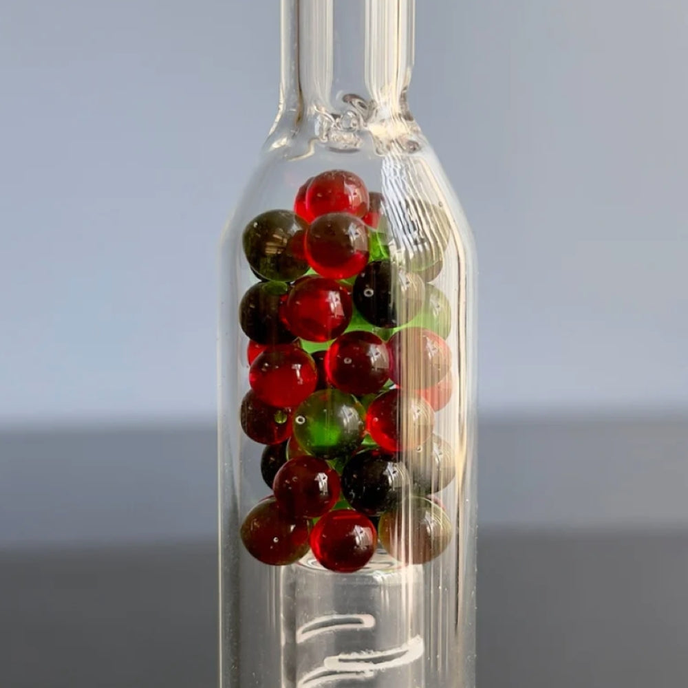 close up of sneaky pete xl rocket stem with multi coloured glass internal beads
