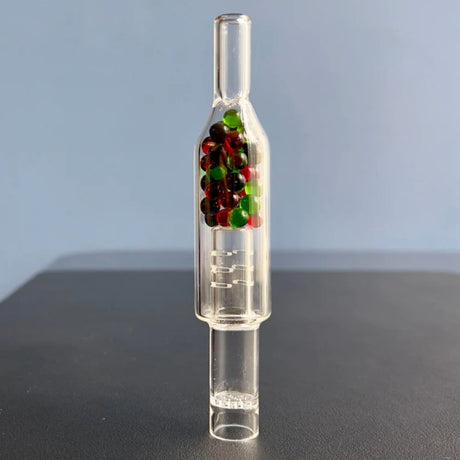 sneaky pete xl rocket stem for tinymight 2 vaporizer stood upright on grey surface