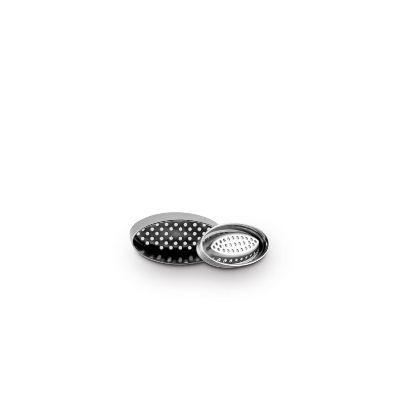 dosing capsule with lid removed for xmax starry 4 vaporizer set on white background