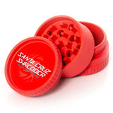 red santa cruz shredder hemp made 3 piece herb grinder in 3 sections set on white background