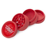 red santa cruz shredder hemp made 4 piece herb grinder in 4 sections set on white background