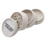 white santa cruz shredder hemp made 4 piece herb grinder in 4 sections set on white background