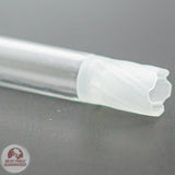close up of sneaky pete glass add-a-cap chamber lying on grey surface