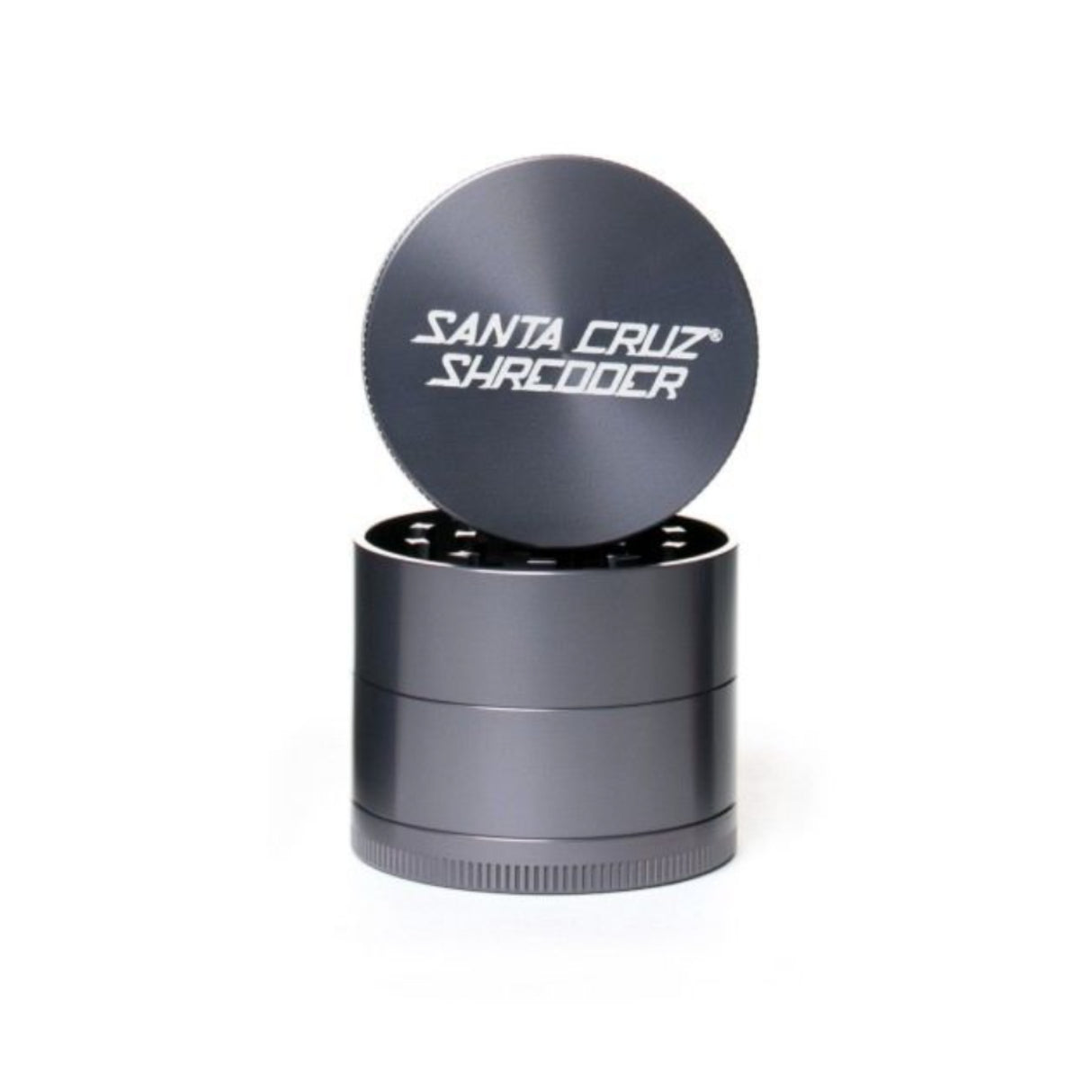 medium gloss Grey 4 piece santa cruz shredder herb grinder with the lid section sitting on top of the base. Santa Cruz logo on lid.