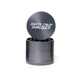 medium gloss Grey 4 piece santa cruz shredder herb grinder with the lid section sitting on top of the base. Santa Cruz logo on lid.